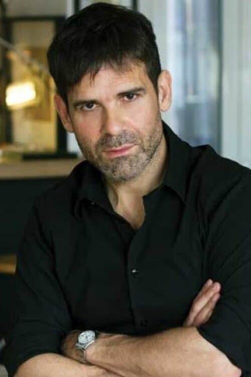 Photo of Menelaos Karamaghiolis